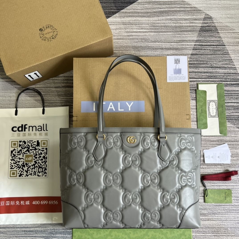 G*u*i shopping bags